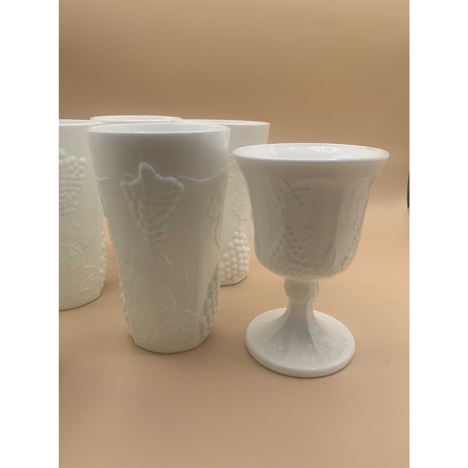 Vintage Sets of Paneled Grape and Leaves Pattern Milk Glass Goblets and Glasses