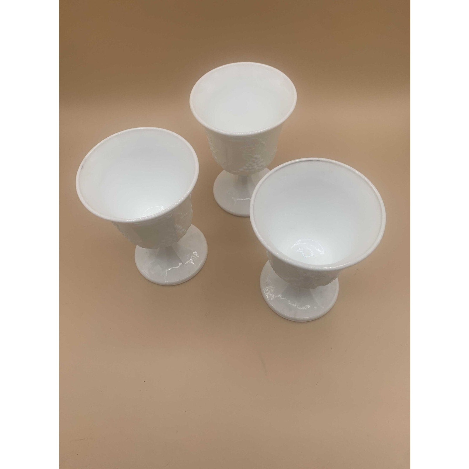 Vintage Sets of Paneled Grape and Leaves Pattern Milk Glass Goblets and Glasses